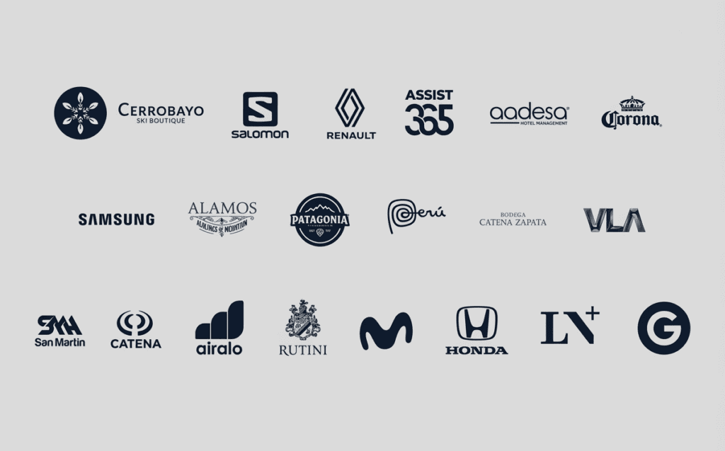 Logos de marcas que confiaron en ViajandoArg: Cerrobayo Ski Boutique, Salomon, Renault, Assist 365, Aadesa Hotel Management, Corona, Samsung, Alamos Alfajores de Montaña, Patagonia, Perú, Bodega Catena Zapata, VLA, SMA San Martín, Catena, Airalo, Rutini, Movistar, Honda, LN+ y Google.